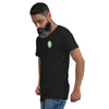 Side View of Man in Black Shirt with Grow Moringa Logo on Left Chest